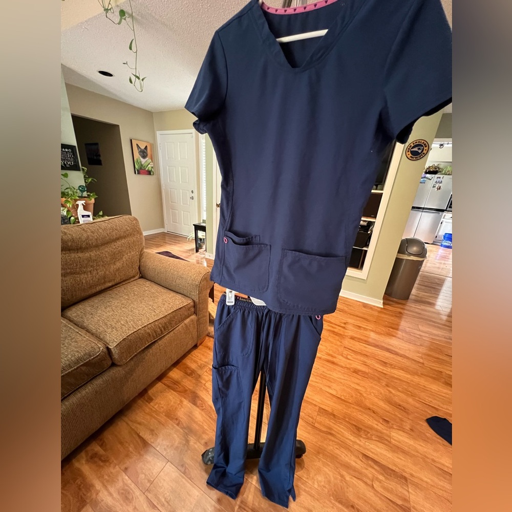 Heart and Soul navy blue scrubs.  1 of 2 sets